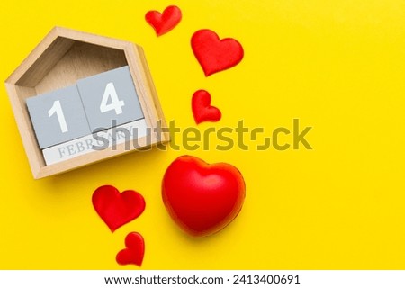 Valentine Day theme with wooden block calendar. Greeting card template for Valentines Day.copy space for text.