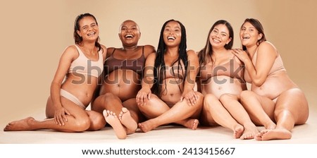 Women group, studio portrait and pregnancy happiness with diversity, smile and solidarity by background. Support, pregnant friends and happy with excited face, future and sitting for hug by backdrop