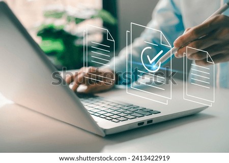 Approved e-document. Businessman assessment for certificate. Digital online documents with sign correct. Guarantee, Quality assurance, standardization. Customer service evaluation satisfaction Royalty-Free Stock Photo #2413422919