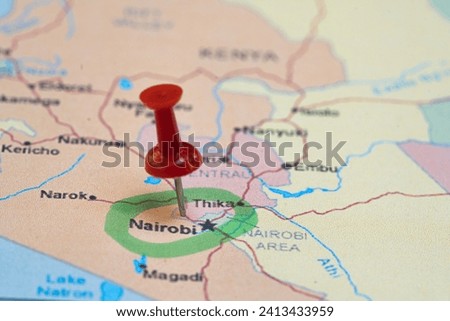 map with a pin in Nairobi, destination, places to visit this year Royalty-Free Stock Photo #2413433959
