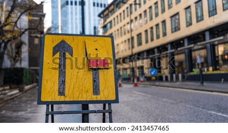 Lane closed sign on busy London street Royalty-Free Stock Photo #2413457465