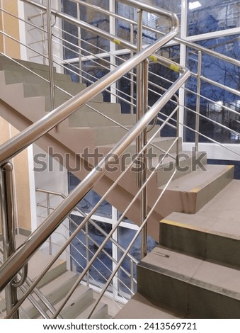 Staircase with railings in an office building