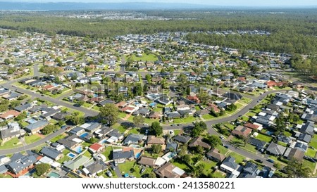 Drone aerial photograph of houses and parklands in the suburb of Werrington County in the greater Sydney region on New South Wales in Australia Royalty-Free Stock Photo #2413580221