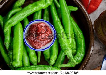 Close-Up 4K Ultra HD Image of Fresh Green Pepper with Red Pepper Paste Dipping Sauce - Culinary Fusion