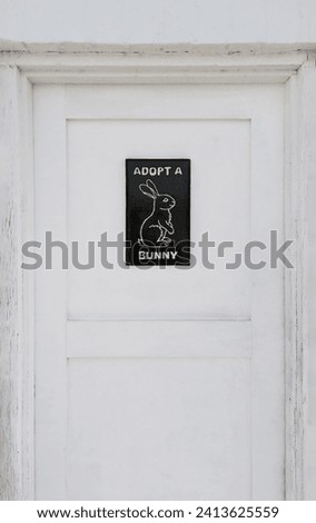 Adopt a bunny rabbit sign