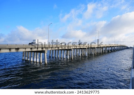 A highway bridge cross Tampa Bay	