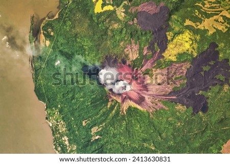 The Smoking Terror. Momotombo in western Nicaragua is an active stratovolcano and a source of renewable energy. Elements of this image furnished by NASA.