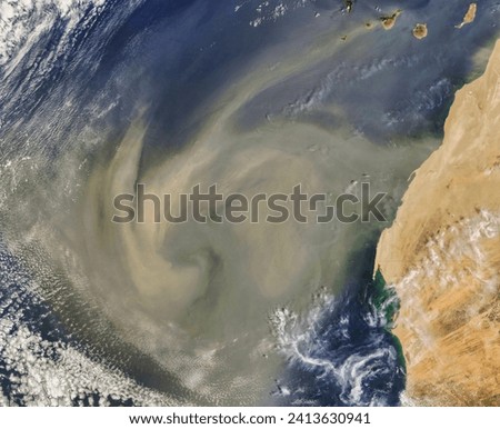 Dust storm off West Africa. . Elements of this image furnished by NASA.