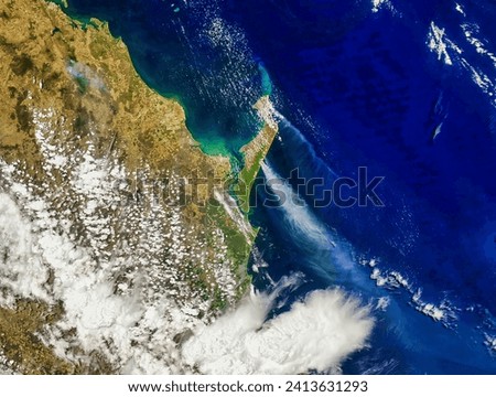 Fraser Island Blazes. Fires have scorched half of a World Heritage Site and threatened local wildlife. Elements of this image furnished by NASA.