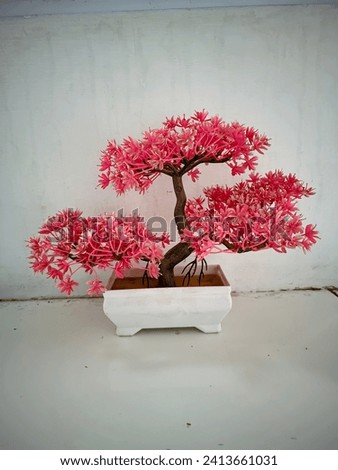 Pink plastic bonsai for table decoration
