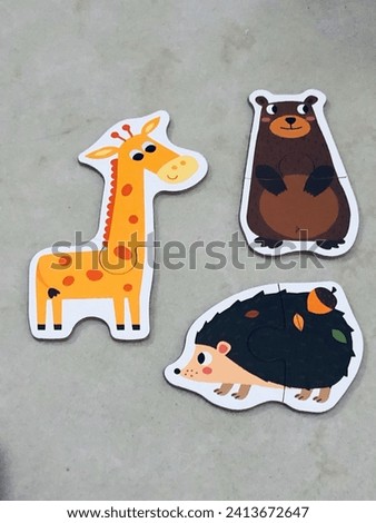 animal shape puzzle, giraffe, bear and hedgehog
