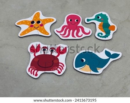 animal shape puzzle, starfish, crab, octopus, seahorse and whale