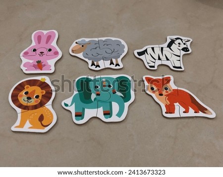 animal shape puzzle, rabbit, sheep, zebra, lion, fox, and elephant