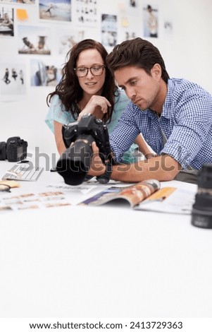 Camera, studio and photographers team editor in an office or workshop for production. Creative, photography and young artists with dslr equipment for editing pictures inspection in modern workplace.