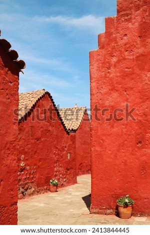 Vivid orange red colored of nun's living quarter in Santa Catalina Monastery, UNESCO world heritage site in Arequipa, Peru, South America