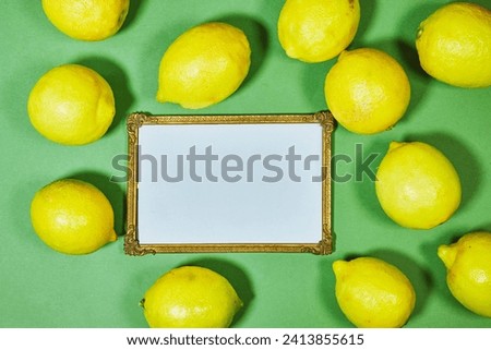 golden picture or photo frame mockup with yellow lemon fruits