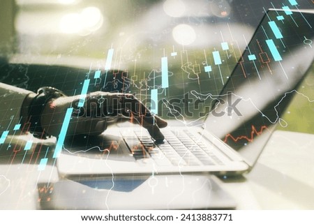 Multi exposure of abstract creative financial chart with world map and with hand typing on computer keyboard on background, research and analytics concept