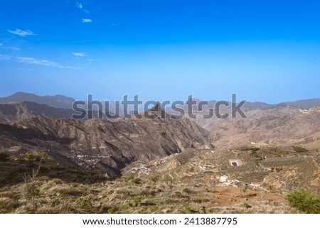 Panoramic View To The Western Mountains Of Gran Canaria With The Holy Mountain Roque Bentayga  Royalty-Free Stock Photo #2413887795