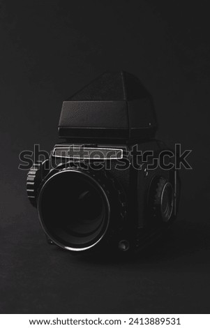 Medium format camera on black background