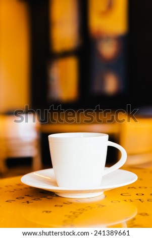 Black coffee in white cup in coffee shop - Vintage effect pictures style