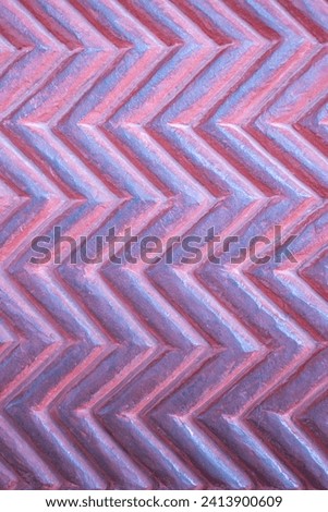 Lilac Chevron pattern background. Classic abstract Purple chevron pattern background, grunge texture. Lilac Pink Chevron arrow pattern. Geometric pattern. Vintage, rustic stone symmetrical background.