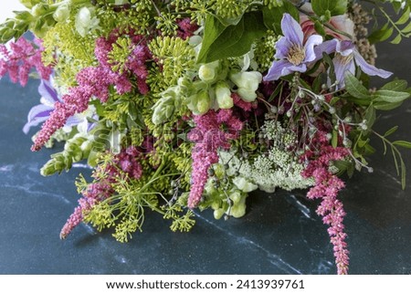 Colorful flower bouquet isolated on a dark background background. Copy space. High quality photo