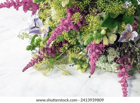 A bouquet of flowers on a light background. High quality photo
