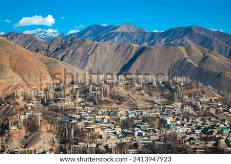 a small town view from the top of the mountain with a lot of residence and less vegetation