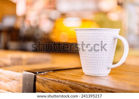 Coffee mug in coffee shop - vintage effect style pictures