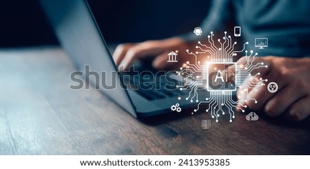 Businessperson using laptop with AI Artificial Intelligence digital interface concept overlay.