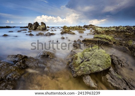 Dreamy Waves. view of rocky beach, located at Terengganu, Malaysia. ( long exposure ,Long Exposure photography.