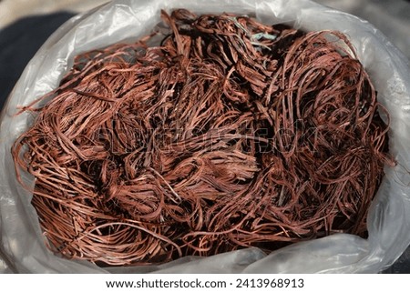 Electrical copper wire  in plastic bag for recycling .  old scrap copper wire for recycling.