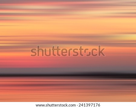 Abstract background. Sunrise sky at the lake with motion blur background.