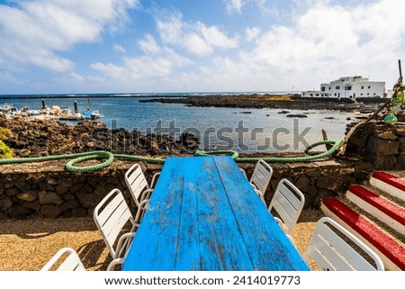 Beautiful landscape of Orzola with white architecture and boats, Lanzarote, Canary Islands, Spain Royalty-Free Stock Photo #2414019773