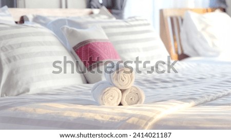 Beautifully folded white towels and toiletries. Luxury bedroom in the bedroom - Stock Photo Bed, hotel, bedroom, hotel room, towel, liquid soap