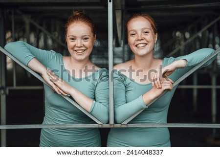 Laughing redheaded twins stock photo