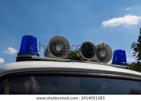 Close-up on the siren of an old Volkspolizei on the top of a Barkas van. The Deutsche Volkspolizei, commonly known as the Volkspolizei or VoPo, was the national police force. Royalty-Free Stock Photo #2414051283