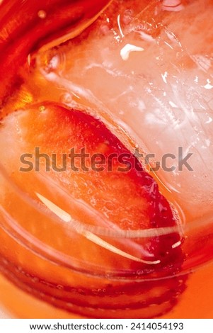 summer cocktail with strawberries in a glass