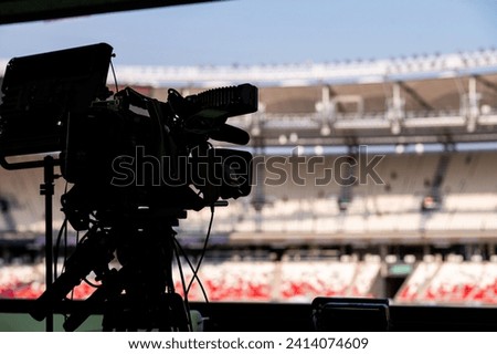 Media Coverage at Sports Event. Camera at modern stadium. Broadcasting and streaming, TV coverage in Paris