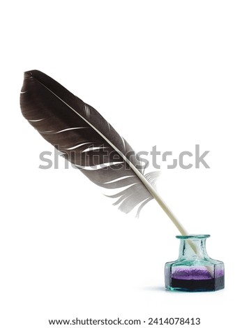 Feather and inkwell isolated on white background. Feather in inkwell. Calligraphy, old education, vintage fonts Royalty-Free Stock Photo #2414078413