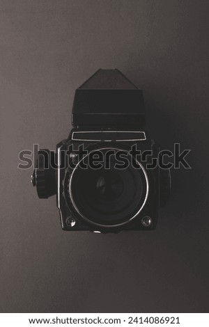 Professional medium format camera on gray background