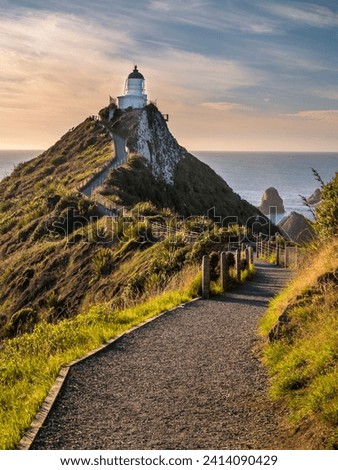 New zealand- south island- southern scenic route- catlins- nugget point lighthouse Royalty-Free Stock Photo #2414090429