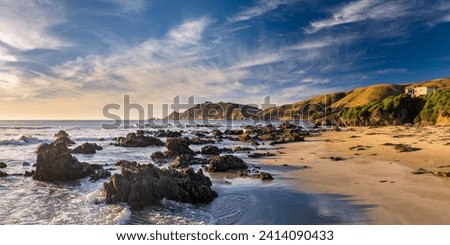 New zealand- south island- southern scenic route- catlins- sunrise at nugget point Royalty-Free Stock Photo #2414090433