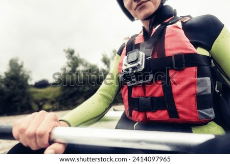 Germany- bavaria- allgaeu- close-up of kayaker with action cam Royalty-Free Stock Photo #2414097965