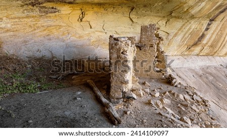 Inside a cliff dwelling with some Anasazi Ruins.   Royalty-Free Stock Photo #2414109097