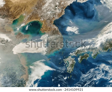 Haze over Korea. On February 6, 2007, thick haze blew across the Yellow Sea and the Korean Peninsula toward Japan. In this image, the band. Elements of this image furnished by NASA.