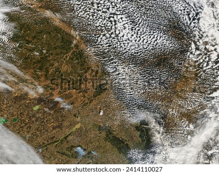 Fires in Southern Siberia. At the southern end of the West Siberia Plain, several large and smoky fires were burning in the area. Elements of this image furnished by NASA.