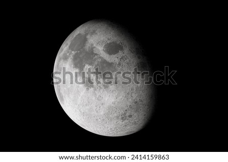 Isolated glowing moon on black background. Shadow passes across the moon