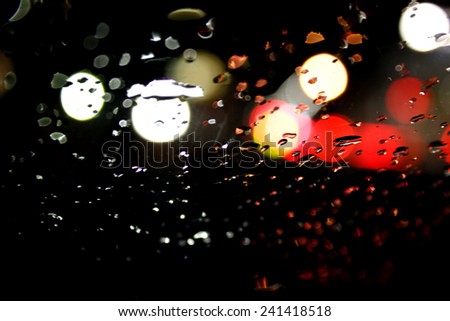 Bokeh rain night day with raindrops