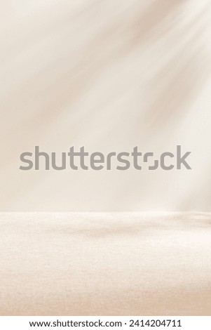 Blank warm lighting background. White and fabric surface.Light and Shadow wallpaper.Space for text. Backdrop.Studio photography. Cozy and Comfortable. Beige backdrop.Minimalist wallpaper. Empty space.